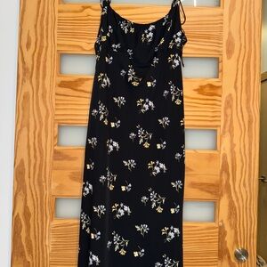 Chic Black Dress with Floral Accents